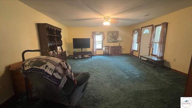 21609 Valley Rd, Warsaw, MO 65355 - carpeted living room with baseboards and a ceiling fan