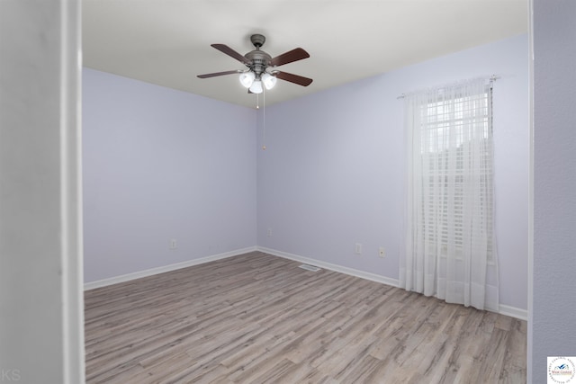 3375 Cedar St, Sedalia, MO 65301 - unfurnished room with wood finished floors and a ceiling fan