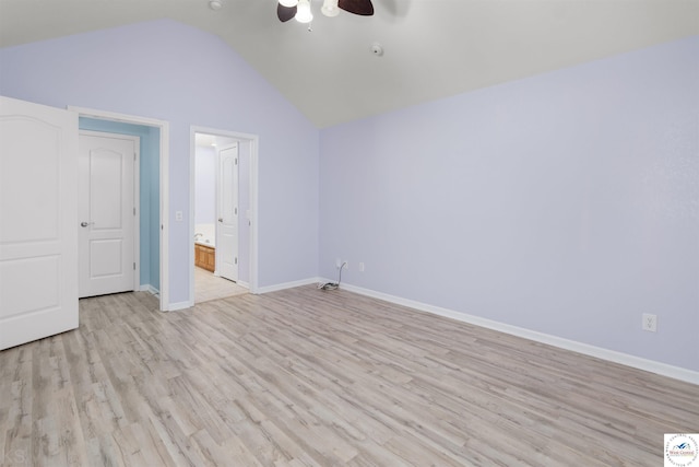 3375 Cedar St, Sedalia, MO 65301 - unfurnished bedroom featuring light wood-style floors, lofted ceiling, ceiling fan, and connected bathroom