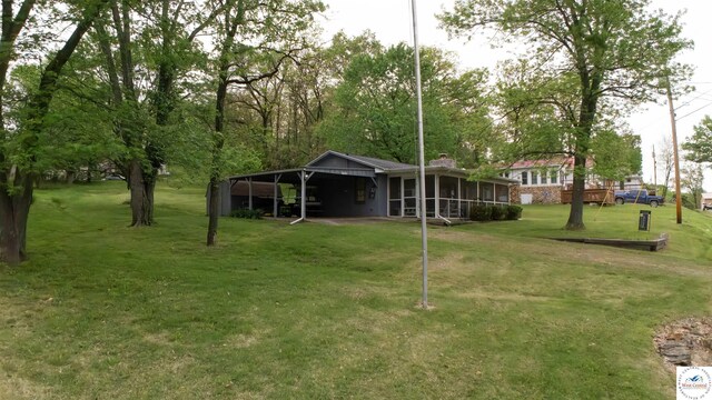 29781 Lake Road 57 Rd, Warsaw, MO 65355 - view of yard with a sunroom