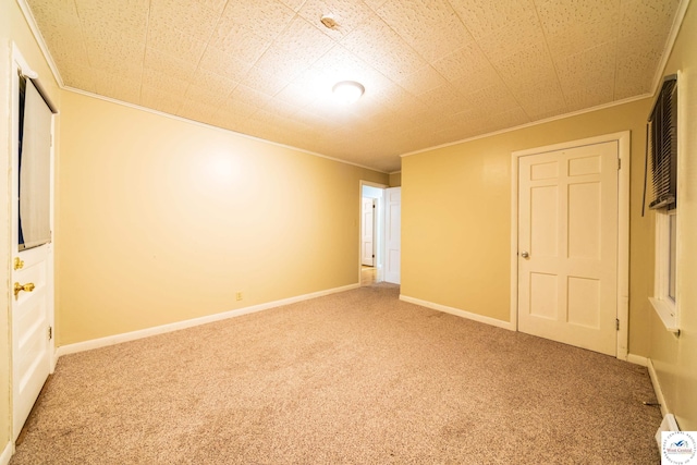 1315 Maple Ln, Sedalia, MO 65301 - unfurnished bedroom featuring crown molding and carpet flooring
