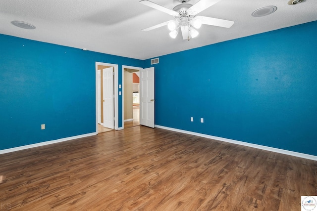 5900 Apple Rd, Sedalia, MO 65301 - spare room with baseboards, visible vents, and wood finished floors