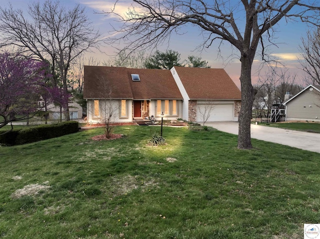 5900 Apple Rd, Sedalia, MO 65301 - cape cod home featuring driveway, a front yard, and an attached garage