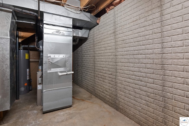 5900 Apple Rd, Sedalia, MO 65301 - utility room featuring heating unit and gas water heater