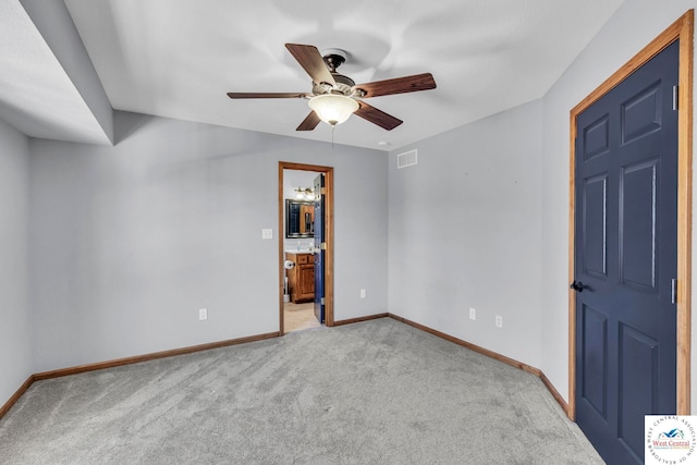 21439 Lost Rd, Warsaw, MO 65355 - interior space featuring connected bathroom, ceiling fan, visible vents, light carpet, and baseboards