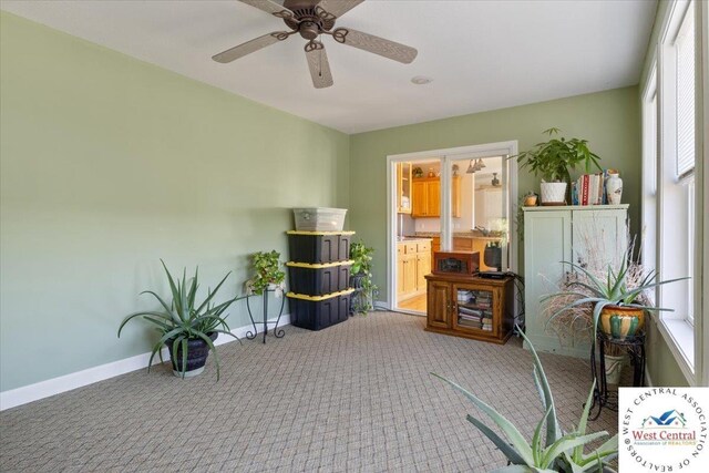22714 Lake Dr, Warsaw, MO 65355 - sitting room featuring carpet floors and ceiling fan