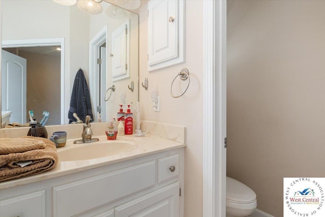 22714 Lake Dr, Warsaw, MO 65355 - bathroom with vanity and toilet