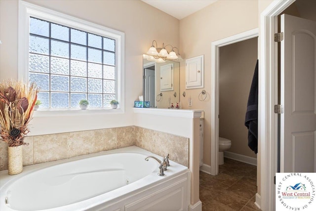 22714 Lake Dr, Warsaw, MO 65355 - bathroom featuring a garden tub and tile patterned flooring