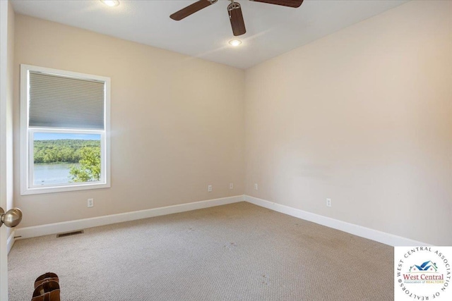 22714 Lake Dr, Warsaw, MO 65355 - carpeted spare room featuring ceiling fan and recessed lighting