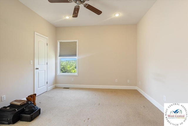 22714 Lake Dr, Warsaw, MO 65355 - spare room featuring ceiling fan, light carpet, and recessed lighting
