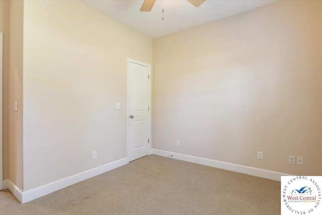 22714 Lake Dr, Warsaw, MO 65355 - empty room featuring light carpet and ceiling fan