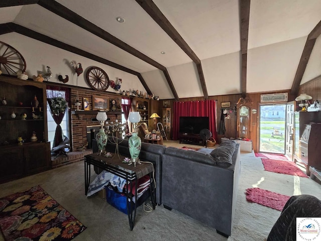 512 N Price Ln, Clinton, MO 64735 - living room with vaulted ceiling with beams, carpet, and a fireplace