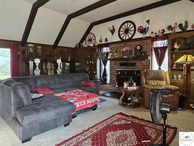 512 N Price Ln, Clinton, MO 64735 - living room with lofted ceiling with beams, a brick fireplace, and carpet