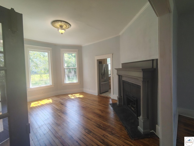 1105 Lay Ave, Warsaw, MO 65355 - unfurnished living room featuring crown molding, dark wood-style floors, and a fireplace