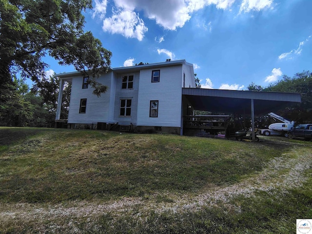 1105 Lay Ave, Warsaw, MO 65355 - back of property featuring a yard