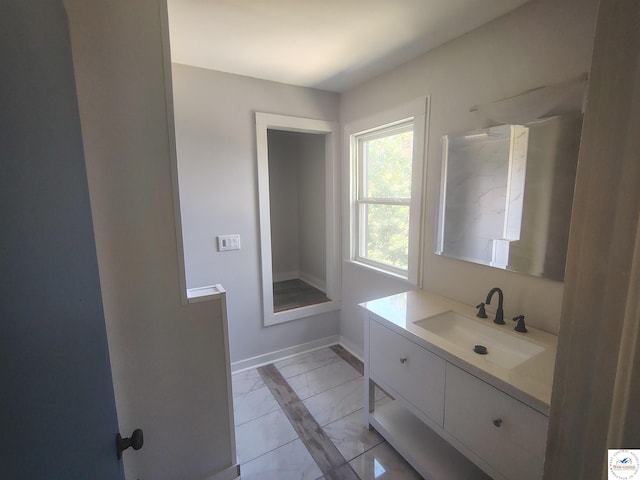 1105 Lay Ave, Warsaw, MO 65355 - bathroom with vanity and marble finish flooring