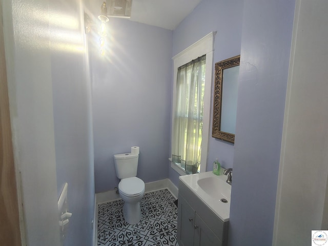1105 Lay Ave, Warsaw, MO 65355 - half bathroom featuring vanity and tile patterned floors