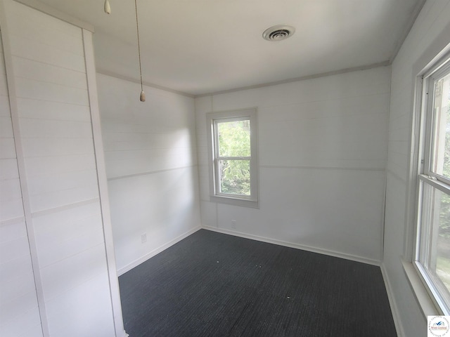 1105 Lay Ave, Warsaw, MO 65355 - unfurnished room with dark colored carpet and baseboards