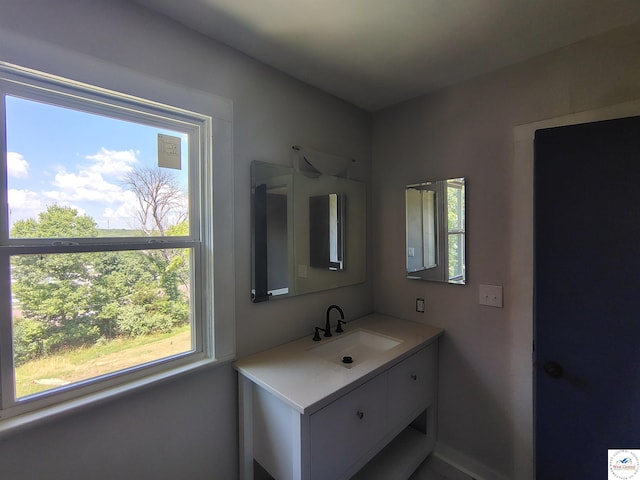 1105 Lay Ave, Warsaw, MO 65355 - bathroom featuring healthy amount of natural light and vanity