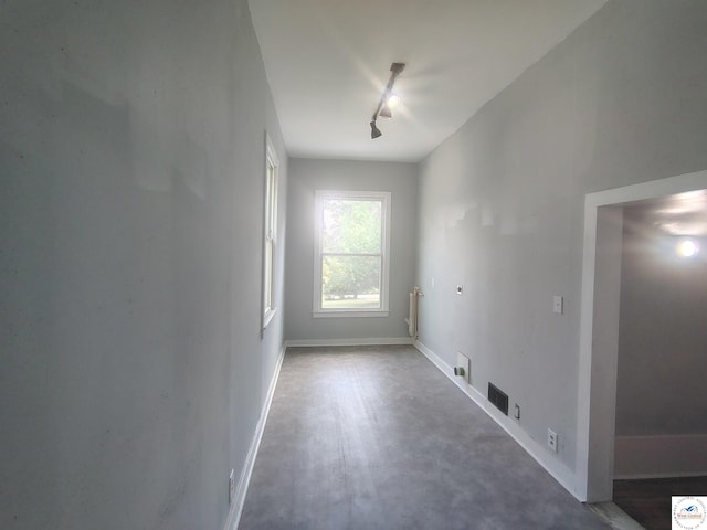 1105 Lay Ave, Warsaw, MO 65355 - empty room with baseboards and rail lighting