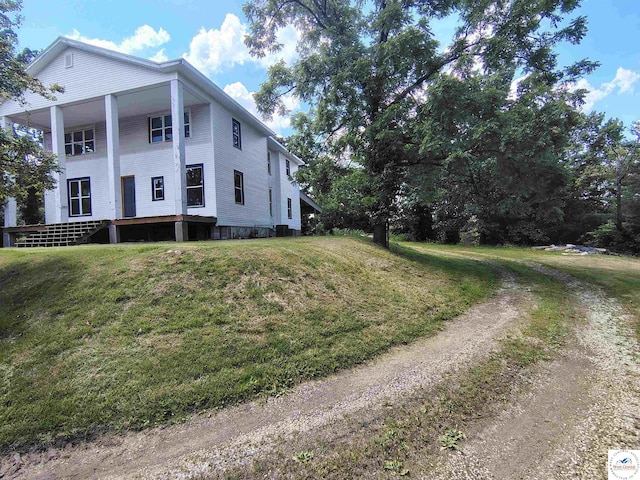 1105 Lay Ave, Warsaw, MO 65355 - view of side of property featuring a yard