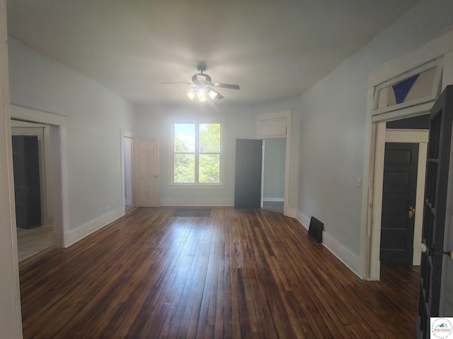 1105 Lay Ave, Warsaw, MO 65355 - unfurnished living room with dark wood-type flooring and ceiling fan