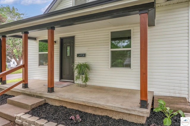 1401 S Park Ave, Sedalia, MO 65301 - property entrance with a porch