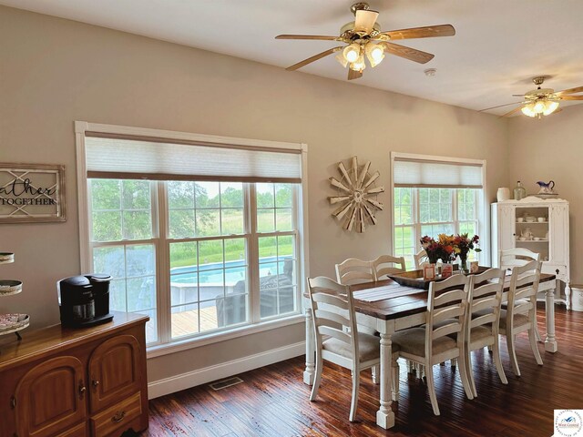165 NE 100th Rd, Clinton, MO 64735 - dining area with dark wood-style flooring, ceiling fan, visible vents, and baseboards