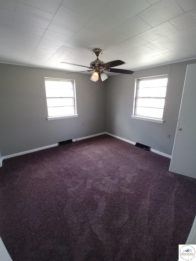 206 N Ohio St, Chilhowee, MO 64733 - carpeted spare room featuring a ceiling fan, visible vents, and baseboards