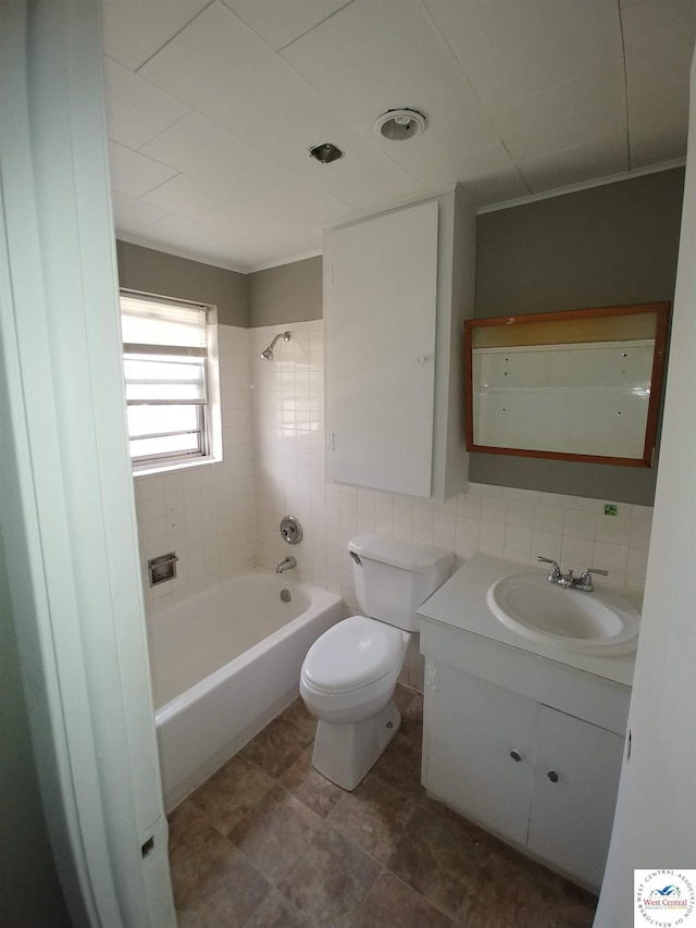 206 N Ohio St, Chilhowee, MO 64733 - full bathroom with tile walls, toilet, shower / tub combination, and vanity