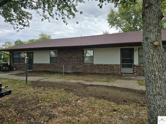 206 N Ohio St, Chilhowee, MO 64733 - view of front of property with a shingled roof and brick siding