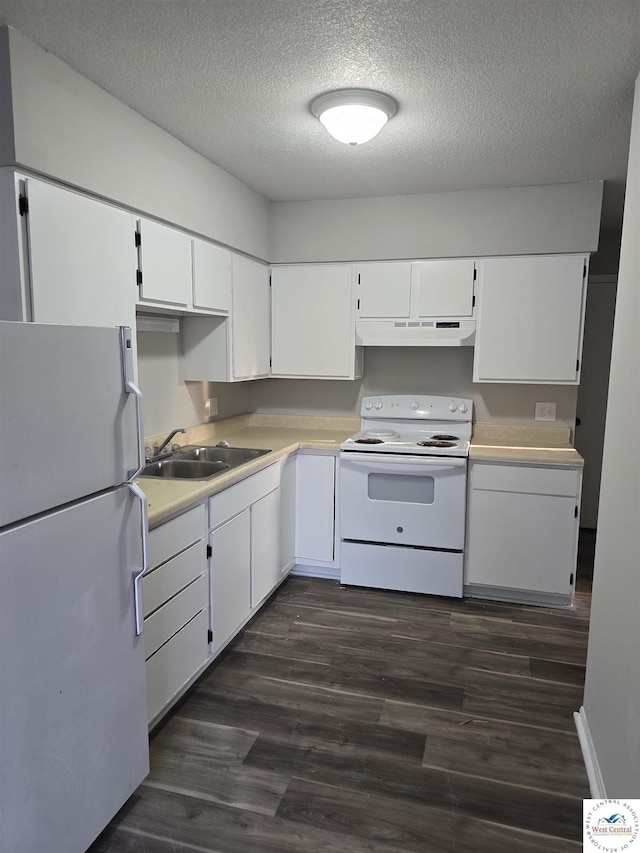 206 N Ohio St, Chilhowee, MO 64733 - kitchen with a textured ceiling, white cabinets, light countertops, under cabinet range hood, and white appliances