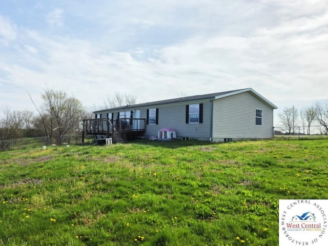 view of front of property featuring a wooden deck