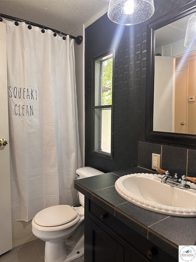 25609 Honey Bear Loop, Warsaw, MO 65355 - bathroom featuring vanity, tile patterned floors, a textured ceiling, and a shower with shower curtain