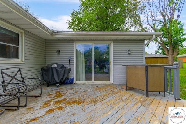 904 Leone Ave, Sedalia, MO 65301 - wooden terrace with grilling area