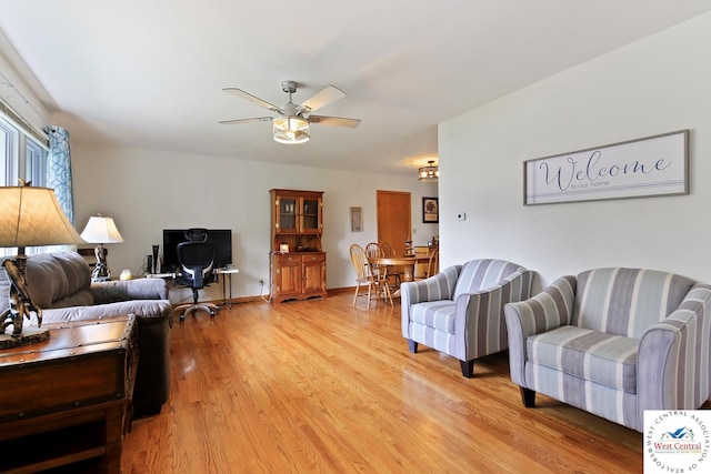 904 Leone Ave, Sedalia, MO 65301 - living area with light wood-style flooring and a ceiling fan