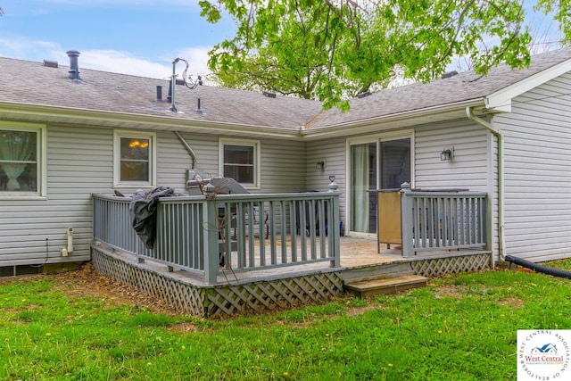 904 Leone Ave, Sedalia, MO 65301 - back of property with a lawn, a deck, and a shingled roof