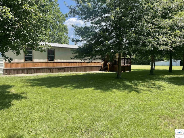 17254 Walnut Rd, Warsaw, MO 65355 - view of green lawn with a deck