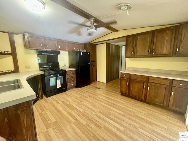 17254 Walnut Rd, Warsaw, MO 65355 - kitchen featuring black appliances, ceiling fan, light wood-style floors, and light countertops