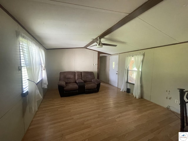 17254 Walnut Rd, Warsaw, MO 65355 - unfurnished living room featuring lofted ceiling, ceiling fan, and light wood finished floors