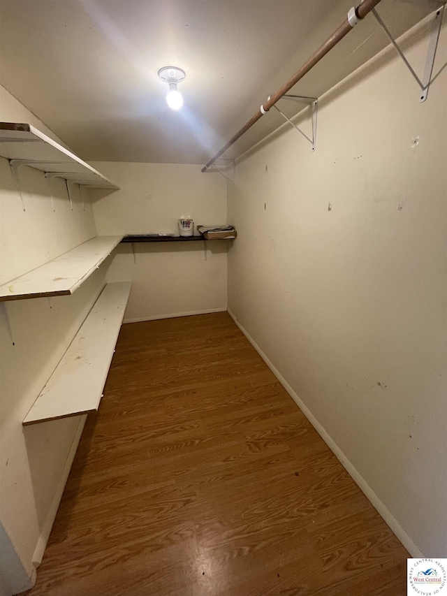 17254 Walnut Rd, Warsaw, MO 65355 - walk in closet with wood finished floors