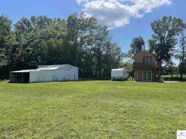 17254 Walnut Rd, Warsaw, MO 65355 - view of grassy yard with an outbuilding