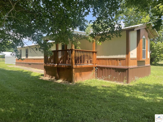 17254 Walnut Rd, Warsaw, MO 65355 - back of house with a deck and a yard