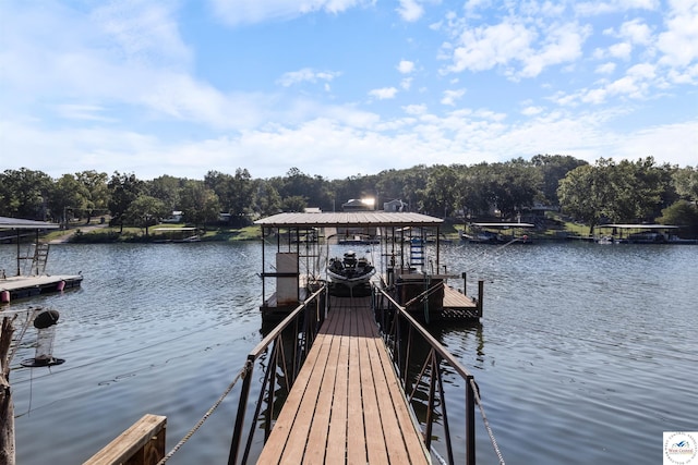 28174 Apex Ave, Warsaw, MO 65355 - dock featuring a water view, boat lift, and view of wooded area