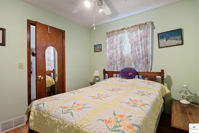 28174 Apex Ave, Warsaw, MO 65355 - bedroom featuring wood finished floors, ceiling fan, and baseboards