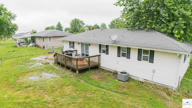252 Shawn Ave, Lincoln, MO 65338 - rear view of property featuring central AC unit, a deck, and a shingled roof