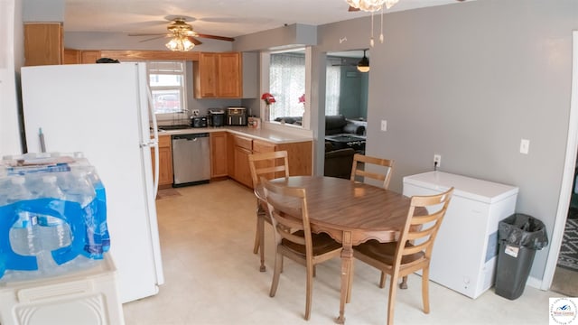 252 Shawn Ave, Lincoln, MO 65338 - kitchen featuring stainless steel dishwasher, ceiling fan, refrigerator, freestanding refrigerator, and light countertops