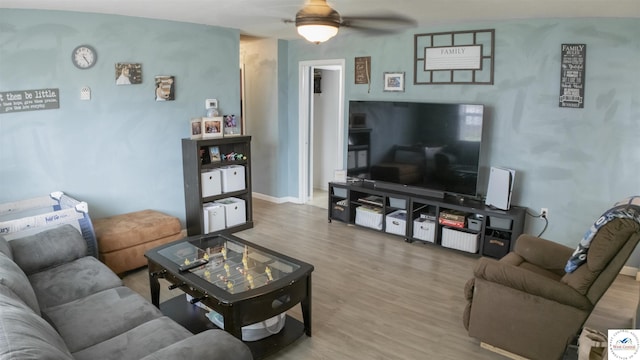 252 Shawn Ave, Lincoln, MO 65338 - living room with wood finished floors, a ceiling fan, and baseboards