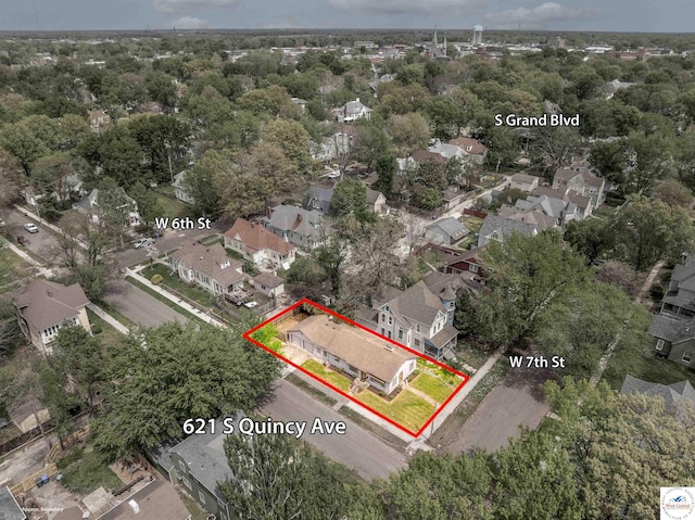 birds eye view of property with a residential view