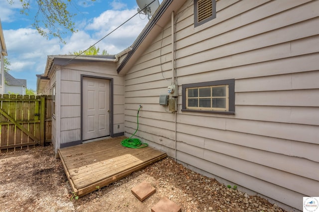 view of home's exterior with fence